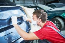 How Do Insurance Companies Decide What Vehicle Repairs They'll Cover After an Accident?